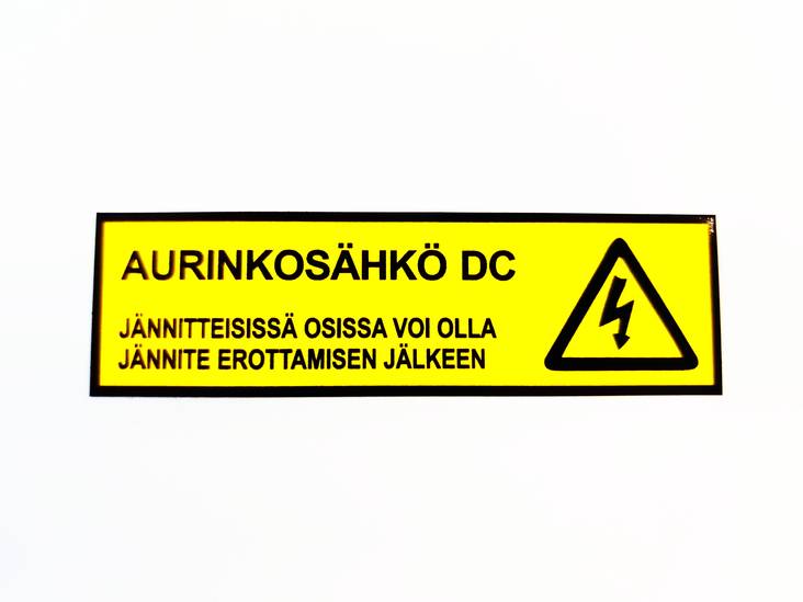 Varoitustarra takasyöttövaara - Aurinkopaneelitelineet - 28181 - 1